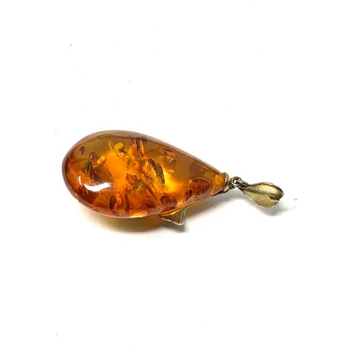 99 - 9ct Gold Polished Natural Amber Pendant (7.4g)