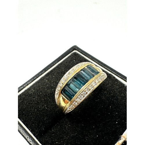 52 - 9ct Gold Blue Topaz & diamond Ring (3.8g)