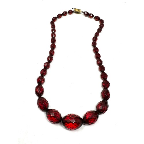 446 - A Faceted Prystal Cherry Bakelite Bead Necklace (36g)