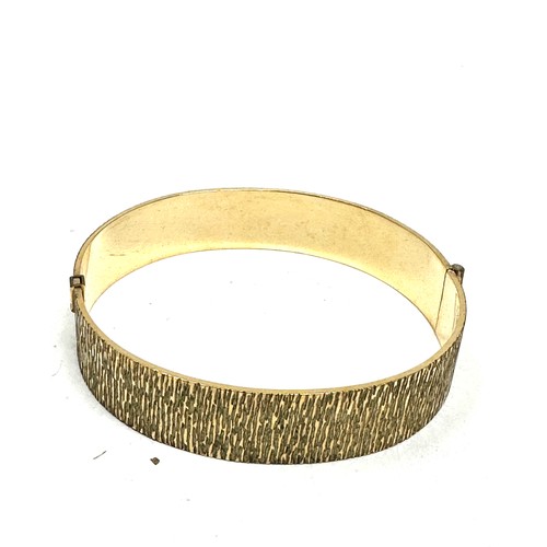 457 - A Vintage 9ct Rolled Gold  Bangle (28g)