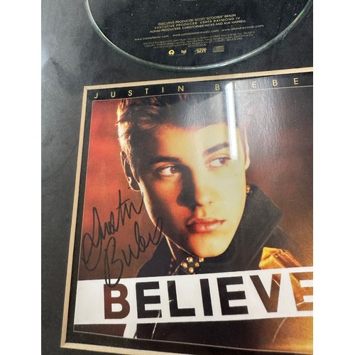 53 - Signed Justin Bieber 'Believe' album 2012, approximate measurements13 x 9.5 inches