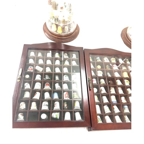 77 - Selection of assorted novelty thimbles, cases and display stands