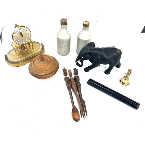 63 - Selection of collectable pieces to include naval ship rolling ruler, carved african salad set, carri... 