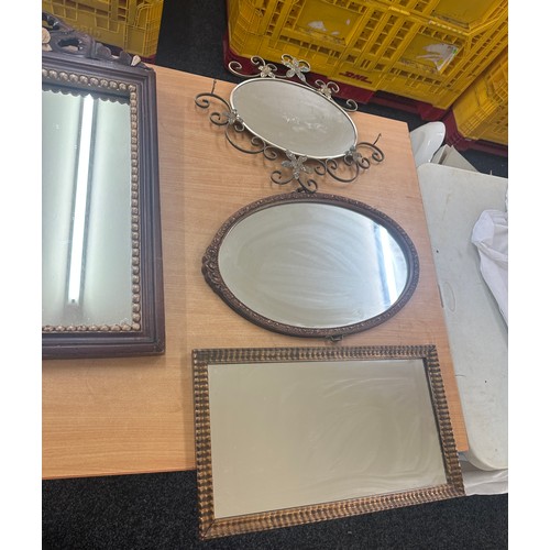 57 - Selection of 4 mirrors largest measures approximately 26 inches by 17 inches wide