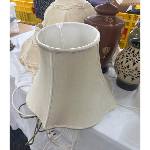 240 - Large selection of vintage and later lamps and shades includes glass, pottery, brass etc