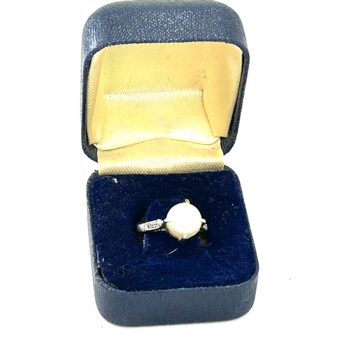 581 - Art Deco antique pearl and diamond set ring, mount tests as palladium, approximate weight 3.2g