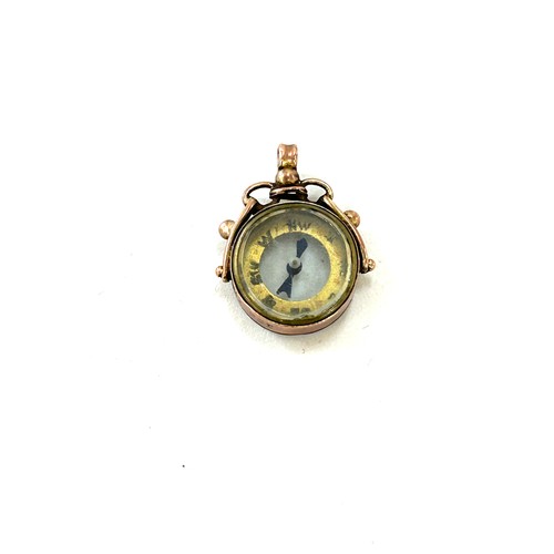 586 - Antique 9ct rose gold compass charm in working order, approximate weight 2.8g