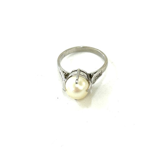 581 - Art Deco antique pearl and diamond set ring, mount tests as palladium, approximate weight 3.2g