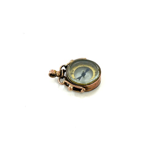 586 - Antique 9ct rose gold compass charm in working order, approximate weight 2.8g