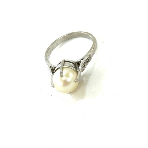 581 - Art Deco antique pearl and diamond set ring, mount tests as palladium, approximate weight 3.2g