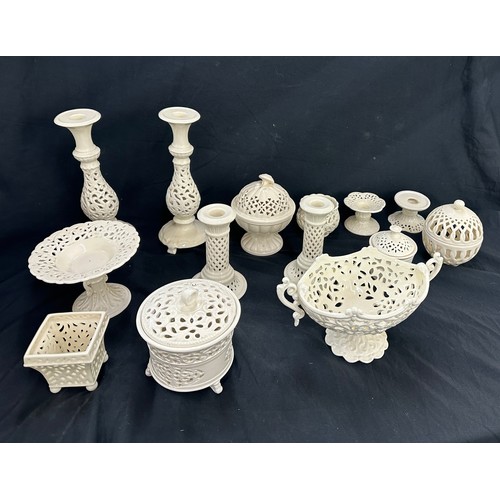 132 - Selection of matching pottery pieces includes candle sticks, vases etc