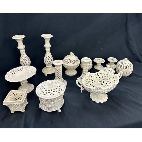 132 - Selection of matching pottery pieces includes candle sticks, vases etc