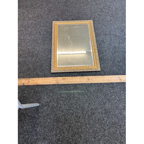 286 - Large bevelled edge gilt framed mirror, measures approximately 25 inches wide 35 inches tall