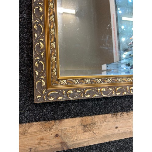 286 - Large bevelled edge gilt framed mirror, measures approximately 25 inches wide 35 inches tall