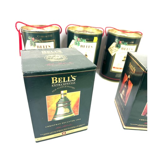 643 - Selection of Bells Old Scotch Whisky Christmas decanters to include Christmas 1990, 1988, 1989, 1992... 