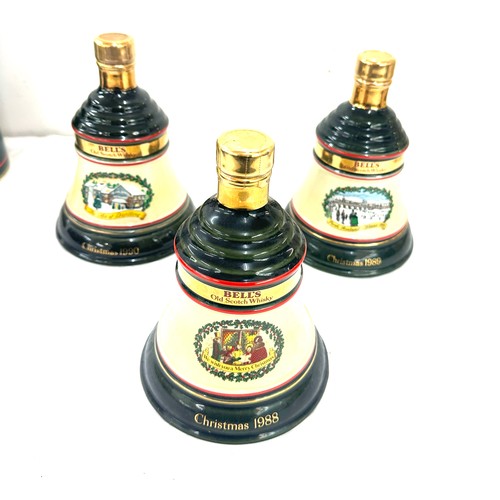 643 - Selection of Bells Old Scotch Whisky Christmas decanters to include Christmas 1990, 1988, 1989, 1992... 