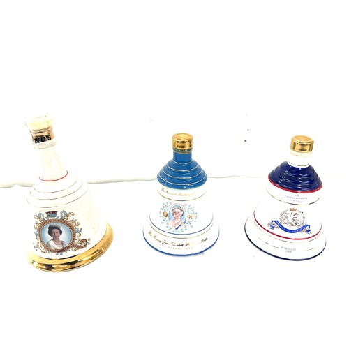 644 - Selection of commemorative Bells Scotch Whisky decanters to include ' Her Majesty Queen Elizabeth II... 