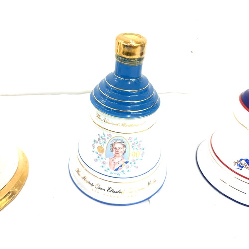 644 - Selection of commemorative Bells Scotch Whisky decanters to include ' Her Majesty Queen Elizabeth II... 