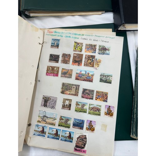 129 - Selection of an assortment of vintage and later stamps to include 8 albums and cover stamps