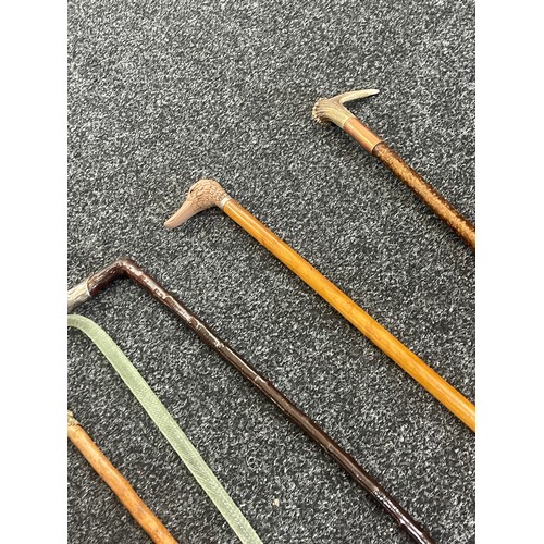 630 - Selection of 5 vintage walking sticks includes glass, silver topped etc