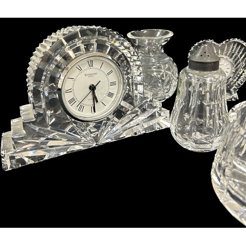 143 - Selection Waterford crystal glass pieces to include 3 mantel clocks, salt and pepper set, small jug,... 