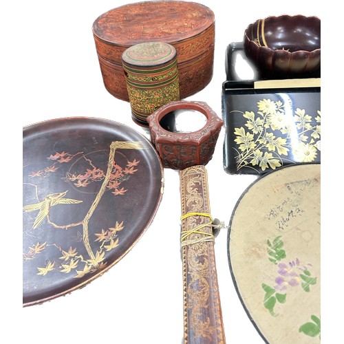 65 - Quantity of Japanese and oriental lacquered boxes, tray fan etc