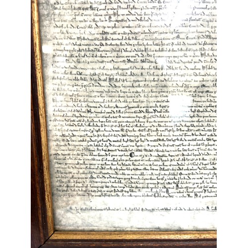 43 - Circa early 1900's copy of the magna carta in an oak frame, Height 22 inches, Width 27 inches