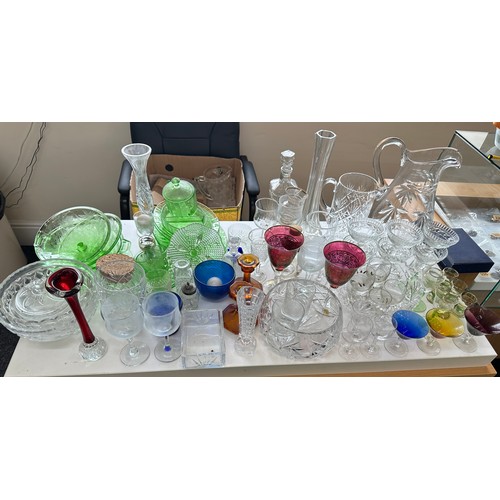 196 - Large selection of assorted glassware to include coloured glass pieces, jugs, glasses, bowl etc