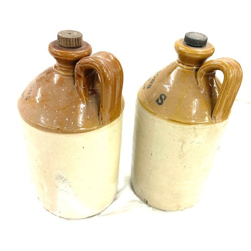 64 - J H Jones & Sons stoneware Beverage bottles with stopppers, Pearsons & Co, approximate height 11.5 i... 