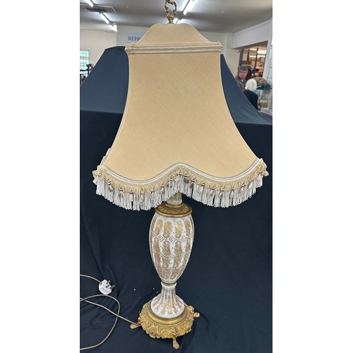 217 - Tall brass and opaque lamp with shade, working order, height of lamp with shade: 43 inches