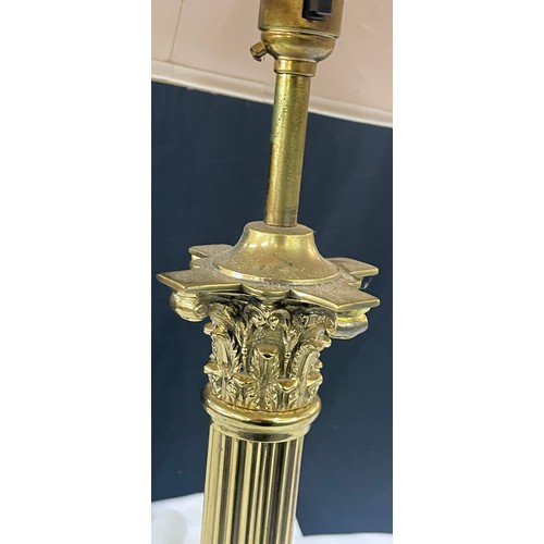 256 - Vintage brass Nelson column based lamp with shade measures approx 26 inches tall- in need of rewirin... 