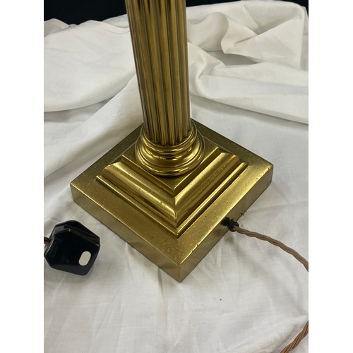 262 - Vintage brass column based lamp measures approx 26 inches tall