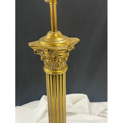 262 - Vintage brass column based lamp measures approx 26 inches tall