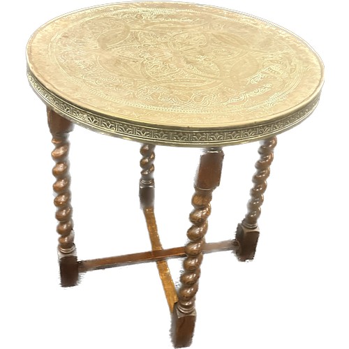 254 - Barley twist folding brass topped table measures approximately 24 inches tall 24 inches diameter