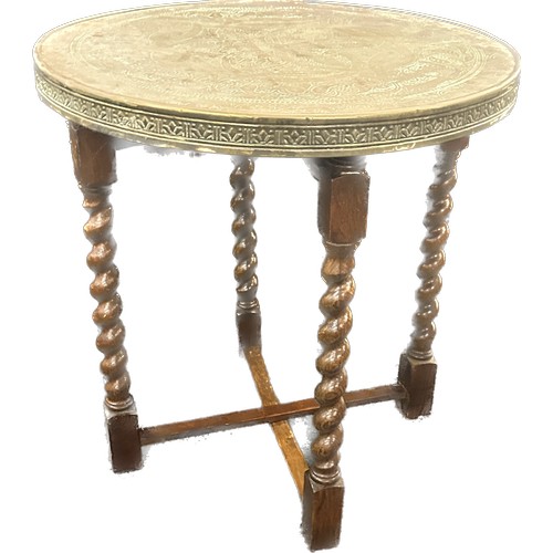 254 - Barley twist folding brass topped table measures approximately 24 inches tall 24 inches diameter