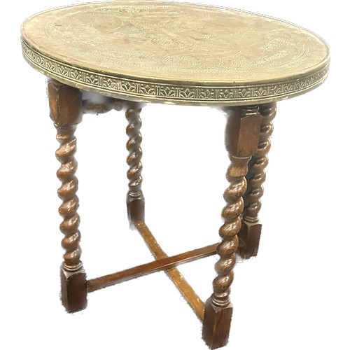 254 - Barley twist folding brass topped table measures approximately 24 inches tall 24 inches diameter