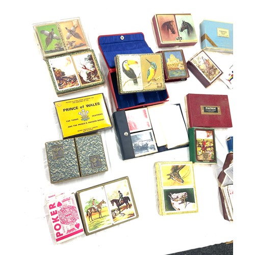 210 - Selection of  assorted vintage and later playing cards