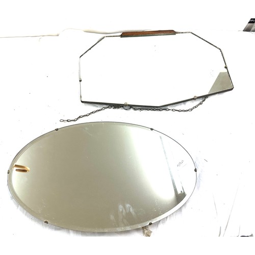 106 - 2 Vintage frameless beveled edge mirrors largest measures approximately 22 inches wide 13 inches lon... 