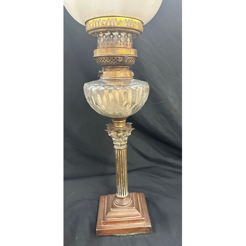 271 - Vintage nelson column base oil lamp, complete with funnel and shade 26 inches tall