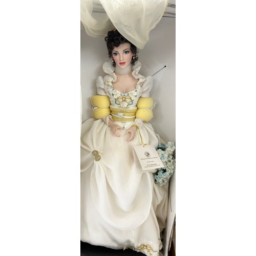 278 - 2 boxed Franklin mint collectors dolls, both on plinths, approximate height: 18 inches including sta... 