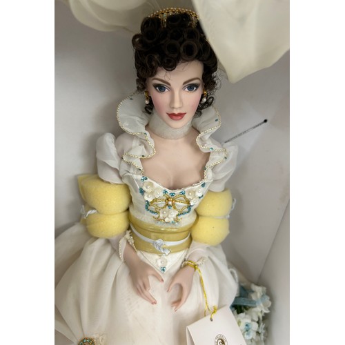 278 - 2 boxed Franklin mint collectors dolls, both on plinths, approximate height: 18 inches including sta... 