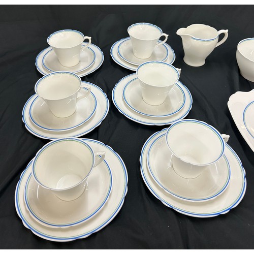 594 - Vintage part Shelley tea set, makers mark to base, reg no 781613, set comprises of: 6 trios, Sugar b... 