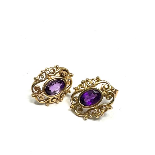 57 - 9ct Gold Amethyst Fancy Stud Dress Earrings (1.3g)