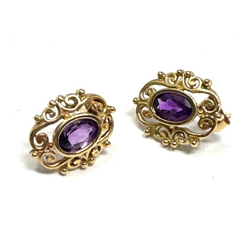 57 - 9ct Gold Amethyst Fancy Stud Dress Earrings (1.3g)