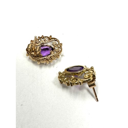 57 - 9ct Gold Amethyst Fancy Stud Dress Earrings (1.3g)