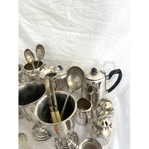 121 - Large collection of silver plate and metal ware, cutlery etc