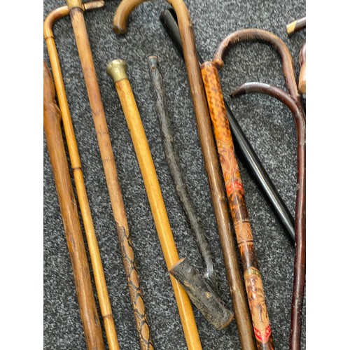 202 - Collection of vintage and antique walking sticks, Shillelagh club etc