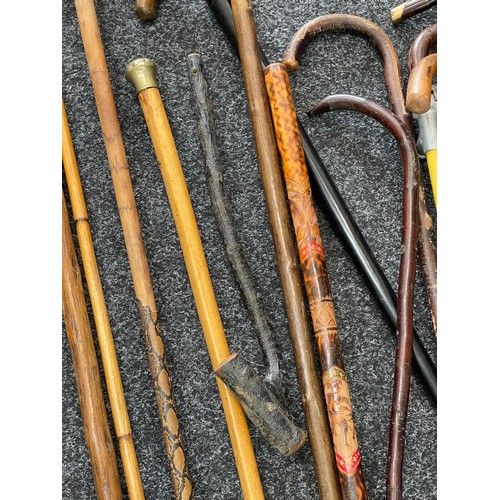 202 - Collection of vintage and antique walking sticks, Shillelagh club etc