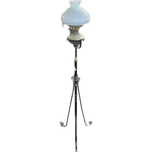 287 - Antique wrought iron oil lamp, extending pole, brass bass oil lamp complete with funnel and shade