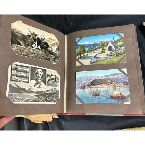 33 - Vintage photo albums with old photographs and a vintage cigarette card album